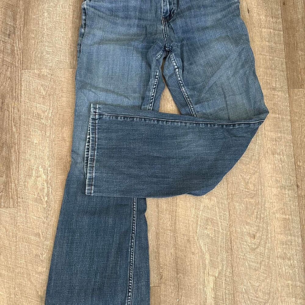 Low rise blue denim jeans with flare legs. Stretchy and soft.